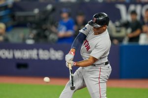 Rafael Devers hits against Toronto