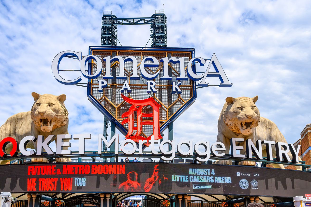 Entrance sign and tiger sculptures at the exterior of...