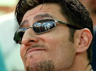 (2/24/04 Ft. Myers, FL) Red Sox pitchers and catchers practice at Red Sox Minor League Spring complex. A grinning Nomar Garciaparra faces the media (in glasses) and, yes, questions about the proposed trade for Alex Rodriguez in the off-season. (