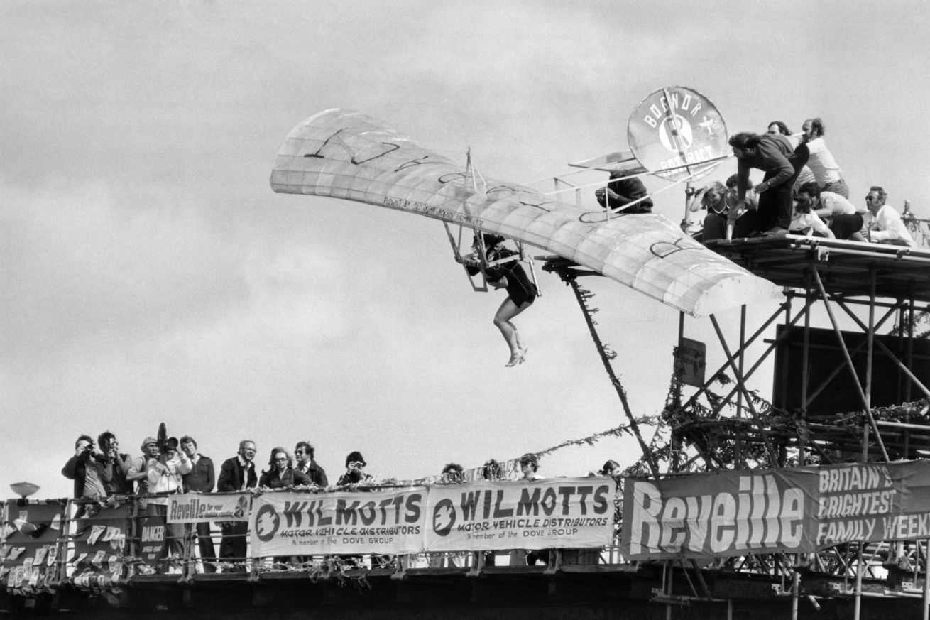 The national birdman rally on Bognor Pier in Sussex Sue Kerr shows off plummet power.