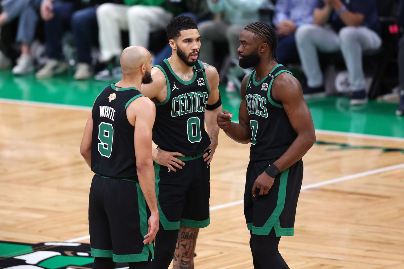 Boston Celtics stars Jayson Tatum, Jaylen Brown, and Derrick White.